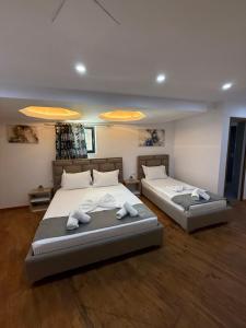 Voodi või voodid majutusasutuse Hotel Summer toas