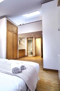 Łóżko lub łóżka w pokoju w obiekcie Apartment Fresa, 3