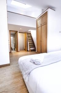 Łóżko lub łóżka w pokoju w obiekcie Apartment Fresa, 3