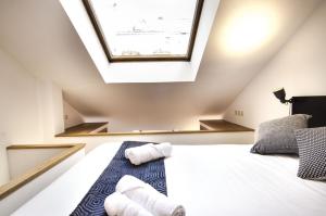 Łóżko lub łóżka w pokoju w obiekcie Apartment Fresa, 3