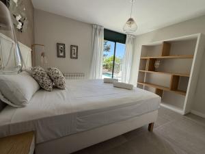 Postel nebo postele na pokoji v ubytování TarracoHomes, Town House La Mora