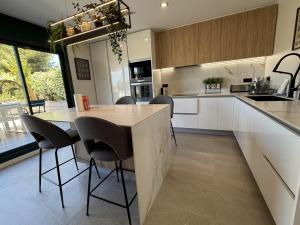 Kuchyň nebo kuchyňský kout v ubytování TarracoHomes, Town House La Mora