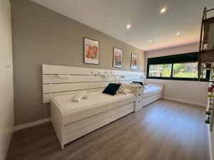 Postel nebo postele na pokoji v ubytování TarracoHomes, Town House La Mora