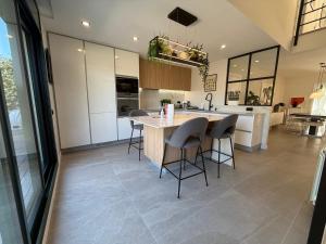 Kuchyň nebo kuchyňský kout v ubytování TarracoHomes, Town House La Mora