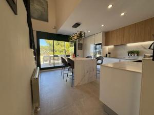 Kuchyň nebo kuchyňský kout v ubytování TarracoHomes, Town House La Mora