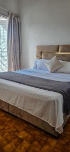 Ένα ή περισσότερα κρεβάτια σε δωμάτιο στο Beachside Retreat in Imi ouadar