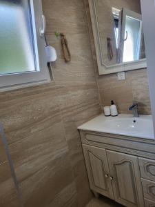 Et badeværelse på Apartmani Vir