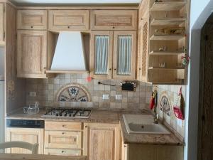 Kuchyň nebo kuchyňský kout v ubytování Villetta a schiera, Pesaro house