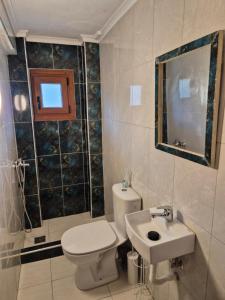 Koupelna v ubytování Yota's House 2