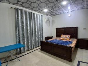 En eller flere senge i et værelse på Heaven View Villa