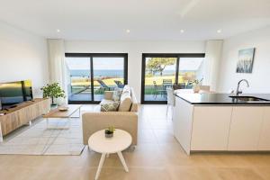 Kuchyň nebo kuchyňský kout v ubytování Sunset Beach Apartment - BY SCH