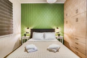 Ένα ή περισσότερα κρεβάτια σε δωμάτιο στο Happy Life Chios Apartment