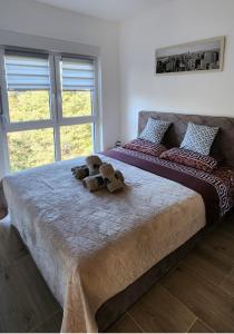 Apartman Tomić 객실 침대