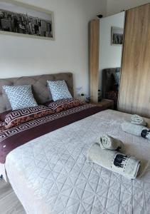 Posteľ alebo postele v izbe v ubytovaní Apartman Tomić