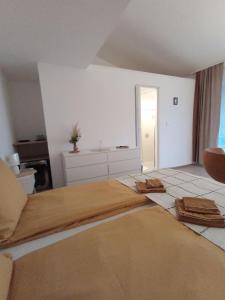Postel nebo postele na pokoji v ubytování My Place Apartmani