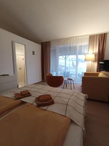 Postel nebo postele na pokoji v ubytování My Place Apartmani