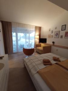 Postel nebo postele na pokoji v ubytování My Place Apartmani