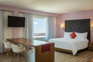 Voodi või voodid majutusasutuse Stain Loft & Suites toas