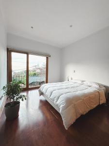 Postel nebo postele na pokoji v ubytování MalaYerba Hostel