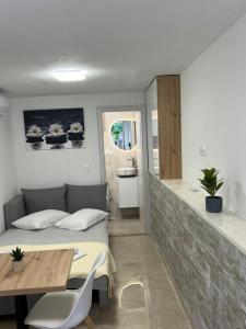 Φωτογραφία από το άλμπουμ του Apartmani Karlo σε Zivogosce +20 φωτογραφίες