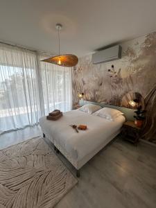 Postel nebo postele na pokoji v ubytování Villa Scappà Porticcio + 38 fotografií