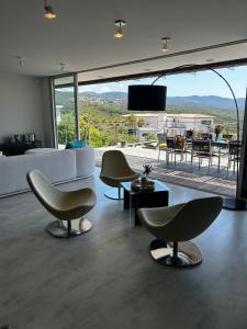 TV a/nebo společenská místnost v ubytování Villa Scappà Porticcio