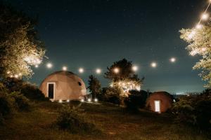 Aed väljaspool majutusasutust Aura - Glamping Experience
