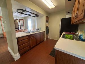 a kitchen with a sink and a counter top at 2BR 1st floor suite close to ISU in Terre Haute