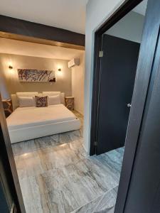 Postel nebo postele na pokoji v ubytování Casita Dulce