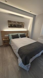 Postel nebo postele na pokoji v ubytování Avenida de Arteixo. Precioso apartamento