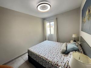 A bed or beds in a room at Luminoso apart Mareverde
