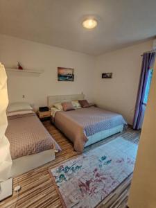 Posteľ alebo postele v izbe v ubytovaní Apartment Oscar