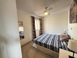 A bed or beds in a room at Luminoso apart Mareverde
