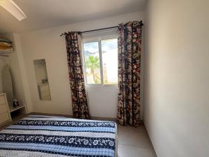 A bed or beds in a room at Luminoso apart Mareverde