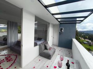 Posezení v ubytování Mirador samsara Penthouse con Jacuzzi al aire libre,piso completo