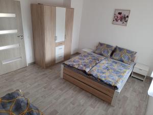 Postel nebo postele na pokoji v ubytování Apartmán Bačka