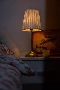 Postel nebo postele na pokoji v ubytování A Cozy Nest in Teslic + 30 fotografií