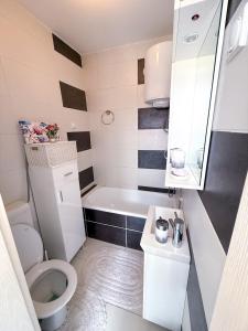 Kuchyň nebo kuchyňský kout v ubytování A Cozy Nest in Teslic