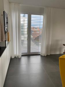 TV a/nebo společenská místnost v ubytování Upper Floor