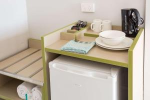 Cucina o angolo cottura di Nightcap at Emerald Star Hotel