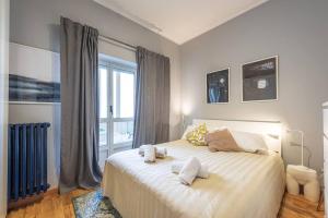 Postel nebo postele na pokoji v ubytování OTR apartment, Alba