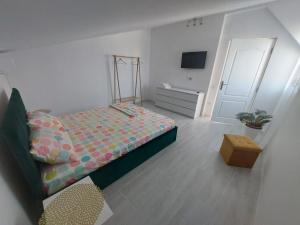 Postel nebo postele na pokoji v ubytování Casa AnaMaria