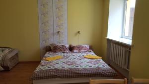 Postel nebo postele na pokoji v ubytování Hotel in Kraslava