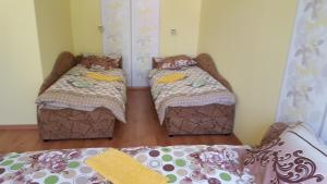 Postel nebo postele na pokoji v ubytování Hotel in Kraslava