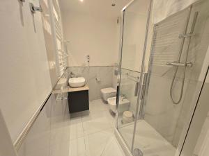 Kúpeľňa v ubytovaní GUVANO Luxury Apartments