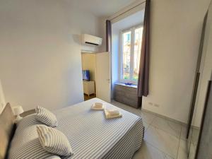 Posteľ alebo postele v izbe v ubytovaní GUVANO Luxury Apartments