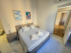 Posteľ alebo postele v izbe v ubytovaní GUVANO Luxury Apartments