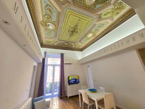 Televízia a/alebo spoločenská miestnosť v ubytovaní GUVANO Luxury Apartments