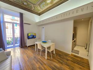 Televízia a/alebo spoločenská miestnosť v ubytovaní GUVANO Luxury Apartments