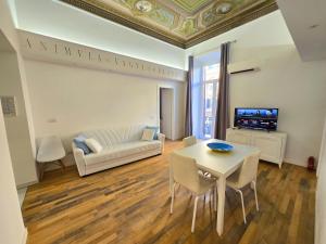 Televízia a/alebo spoločenská miestnosť v ubytovaní GUVANO Luxury Apartments